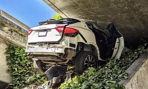 Speeding Driver Crashes Maserati Levante Into Overpass During Highway Pursuit