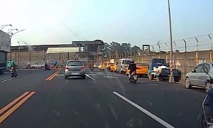 Speeding Scooter Rider Crashes Hard, Helmets Flying, But the Cigarette Stays