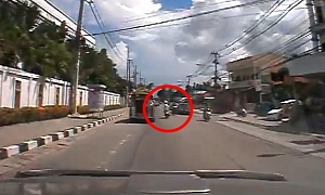Speeding Thai Scooter Rider Misses Car and Bike by Inches