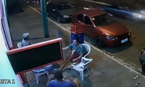 Speeding Tire Takes Out Man Drinking Beer on the Sidewalk