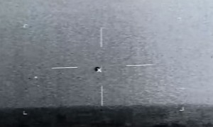 Spherical UFO Spotted Flying, Going Underwater in New U.S. Navy Leak