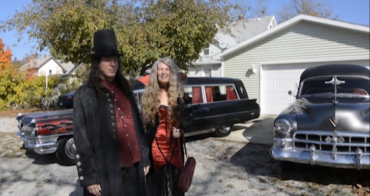 Spooky Couple Drive Cadillac Hearses