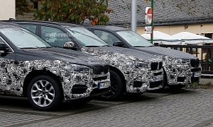 Spyshots: 2014 BMW X4 Spied at the Nurburgring Next to Its Brothers