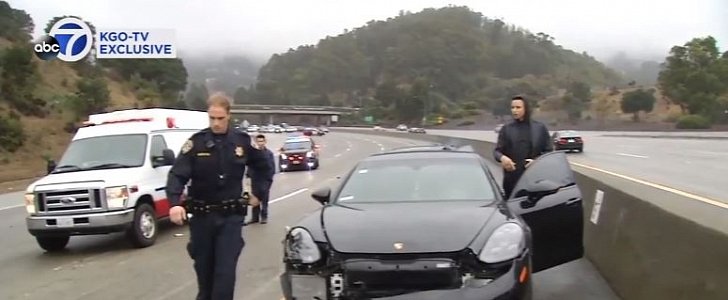Steph Curry stands outside his wrecked Porsche on California highway