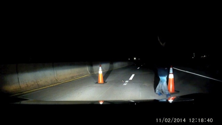 Suspicious roadblock at night