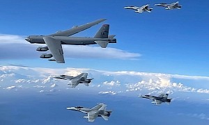 Stratofortress Flying With F-18s Looks Like Mother Goose Strolling With Goslings