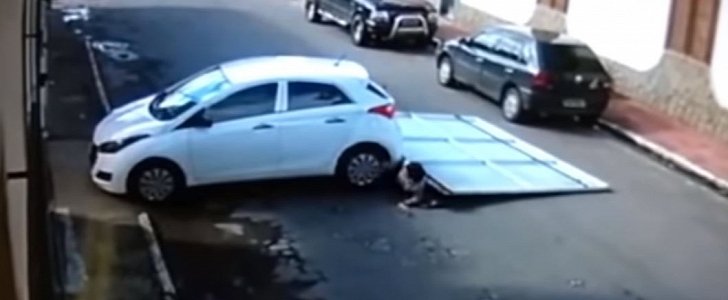 Elderly couple gets pinned under car after being hit by car and garage door