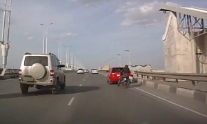 Stupid Motorcyclist Crashes on the Highway