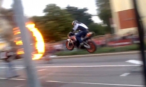 Superbike Jumps through Ring of Fire