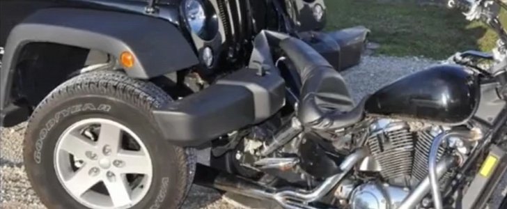 The DUI suspect's vehicle had a motorcycle attached to its bumper