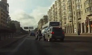 SUV Crashes into Rider