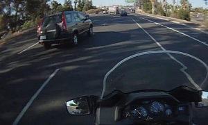 SUV Driver Almost Crashing into Biker