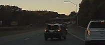 SUVs Duke It Out on The Highway in Dangerous Road Rage Altercation