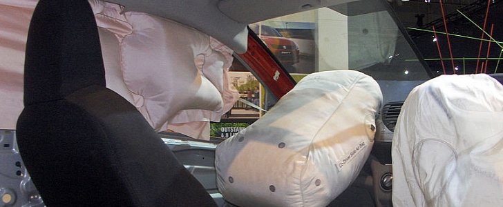Deployed airbags in car
