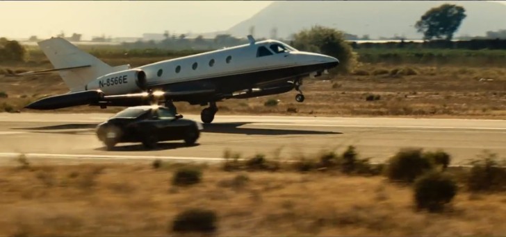Liam Neeson Taking out an airplane with a Porsche