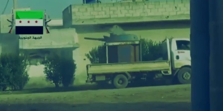 Tank Turret on the Back of a Truck Shoes Ghetto Side of Syrian War