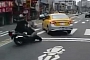 Taxi Manages to Crash Two Scooters in One Turn