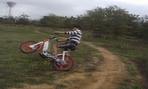 Teenager Stunt-Rides a Vespa Ciao Off-Road