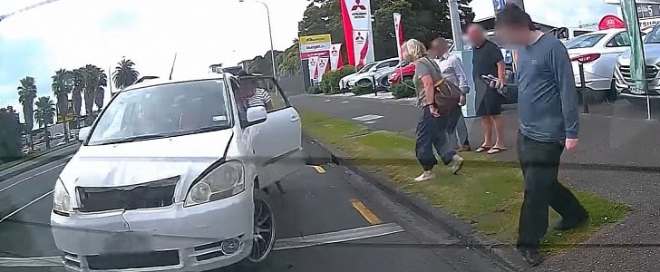 Woman falls out of car as it tries to flee the scene of a crash it caused