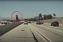 Tesla Model 3 Avoids Killer Loose Tire in What Looks like Deleted "Rubber" Scene