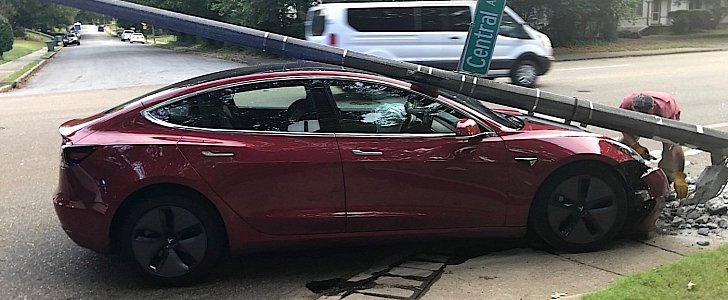 Tesla Model 3 with a pole on its head