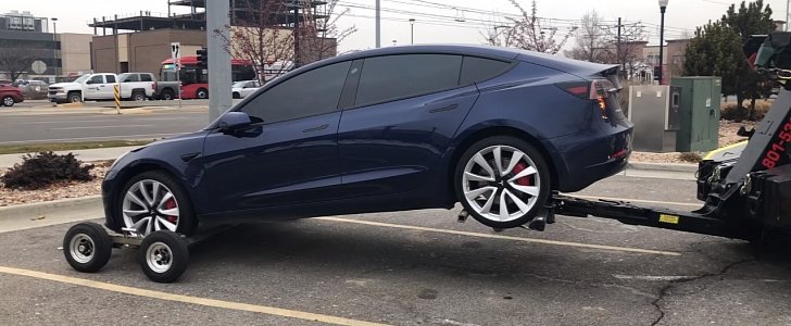 Tesla Model 3 getting towed