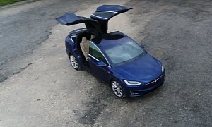Tesla Model X-Mas Easter Egg Sees Electric SUV Flipping Rear Doors Like a Falcon
