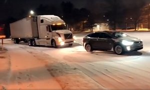 Tesla Model X Pulls Huge Volvo Semi Stuck in the Snow Up a Hill