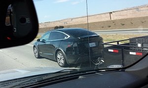 Tesla Model X Spotted while Towing a Dump Trailer, Testing 10,000 lbs Towing Capacity