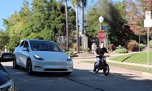 Tesla Model Y Drag Races Very Fast Electric "Bicycle" in Malibu