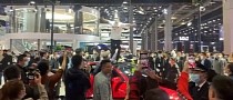 Tesla Owner Climbs on a Model 3 at Auto Shanghai 2021 Over Brake Failure