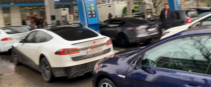 Tesla and other EV owners block gas station in protest against ICEing