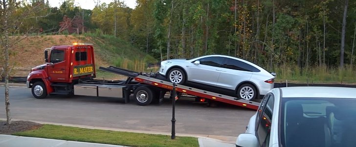 Tesla Model X loading on flatbed
