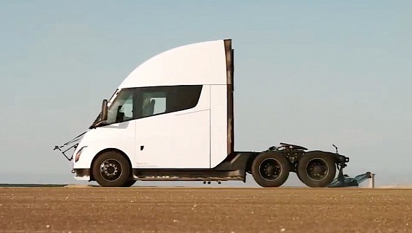 Tesla Semi being driven over a ladder