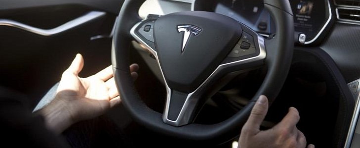 Tesla Motors has warned everybody they should not take their hands off the steering wheel 