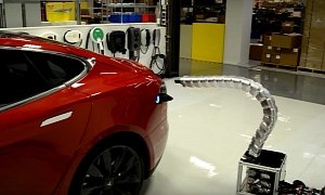 Tesla’s Creepy Metal Snake Autonomous Charger Can Find the Car on Its Own