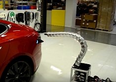 Tesla’s Creepy Metal Snake Autonomous Charger Can Find the Car on Its Own