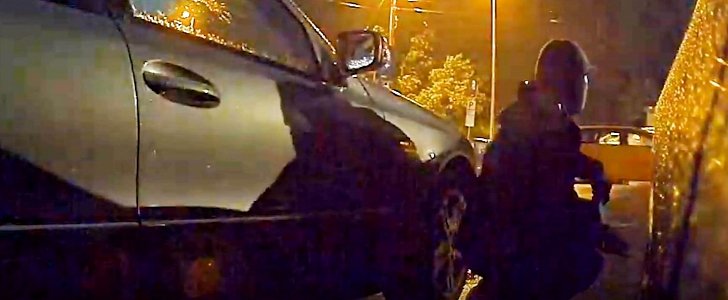 Car burglar tries to steal wheels off parked Tesla, is discouraged by Sentry Mode