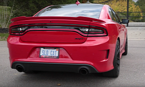 The 2015 Dodge Charger SRT Hellcat Sounds Ludicrous without Its Mid Mufflers