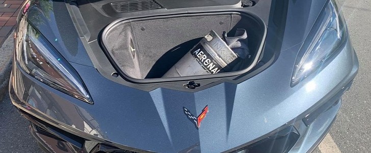C8 Corvette with a beer keg in the frunk