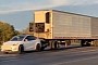 The Craziest Thing You'll See Today Is a Tesla Model Y Towing Massive Semi Trailer