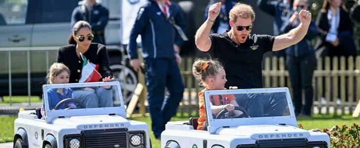 The Duke and Duchess of Sussex in electric mini-Land Rover Defenders