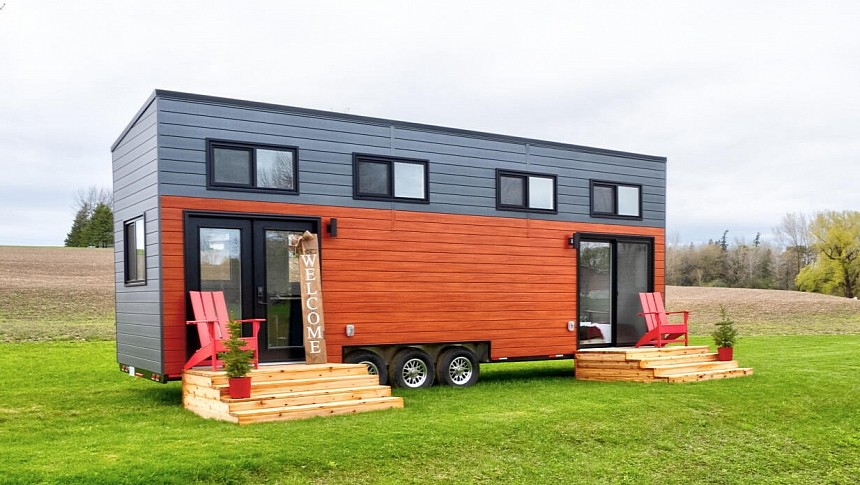 This adorable two-bedroom tiny house flaunts two separate patios