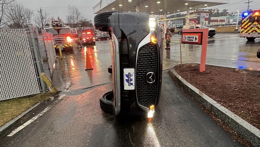 Mazda CX-5 flipped over at the entrance of a drive-thru