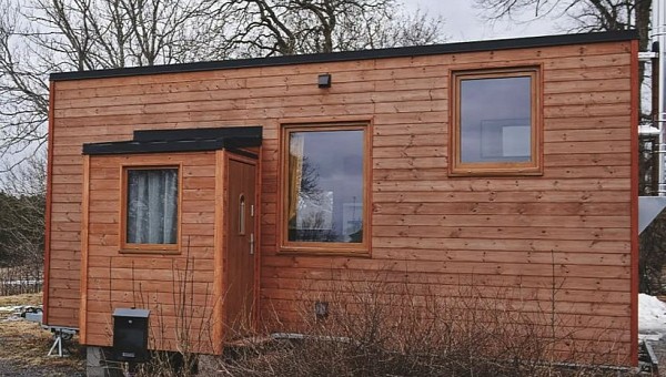 Elise is a very compact tiny home that uses a creative layout to offer accommodation for a family of three