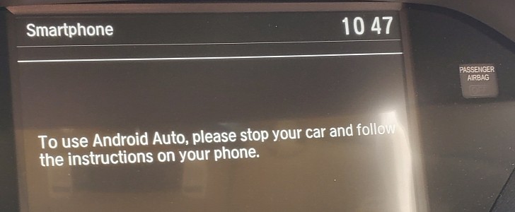 The message displayed on the head unit in some cars