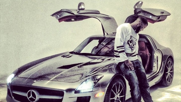 The Game next to his Mercedes SLS AMG