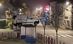 The Mystery of a Cargo Van Perched on Top of a Bus Shelter Has Been Solved
