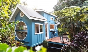 The Oasis Tiny Home With Circular Front Window and Vaulted Ceilings Is a Piece of Paradise