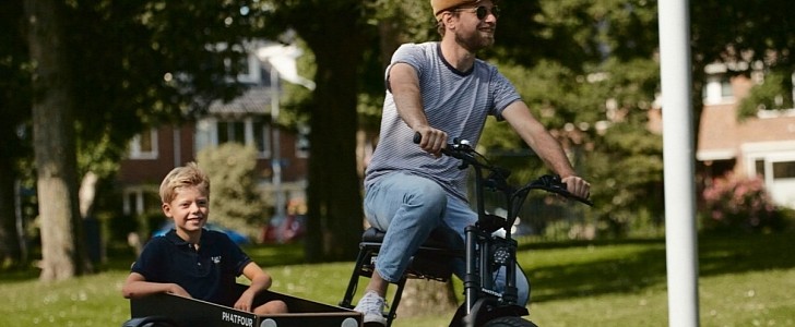The Phatfour Sidecar is an e-bike sidecar to take your child or pet on rides, or carry groceries